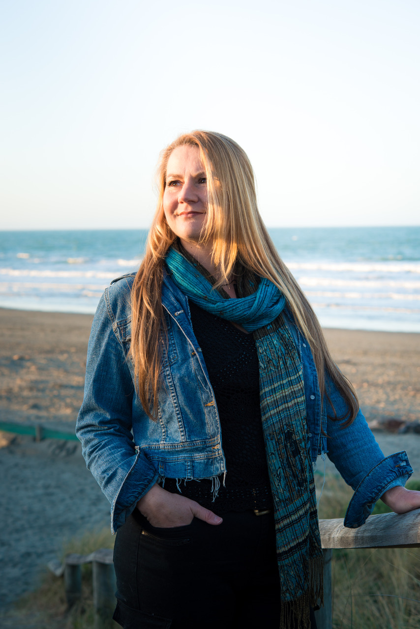 Stephanie Ruth Author standing on beach